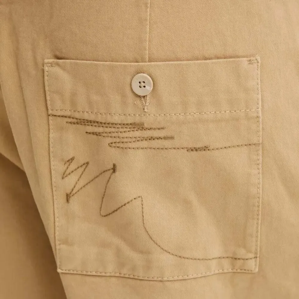 Брюки с вышивкой и карманами