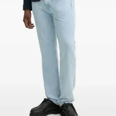 Джинсы с эффектом потертости