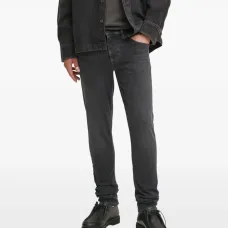 Джинсы с эффектом потертости