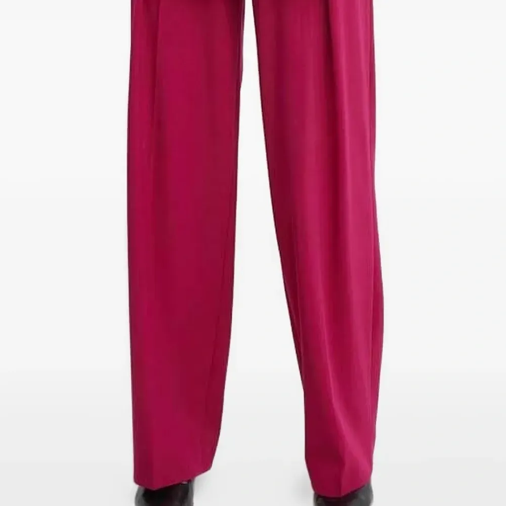 Брюки со складками