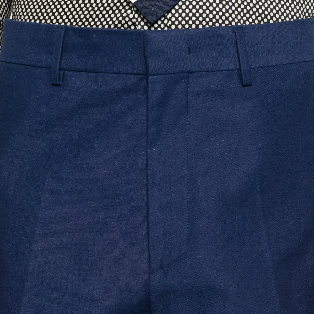 брюки с карманами