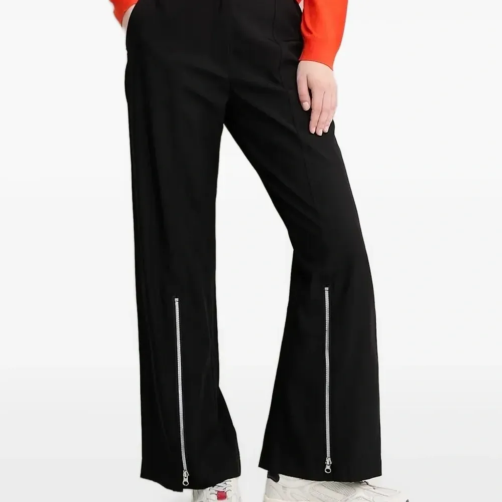 Брюки с молниями