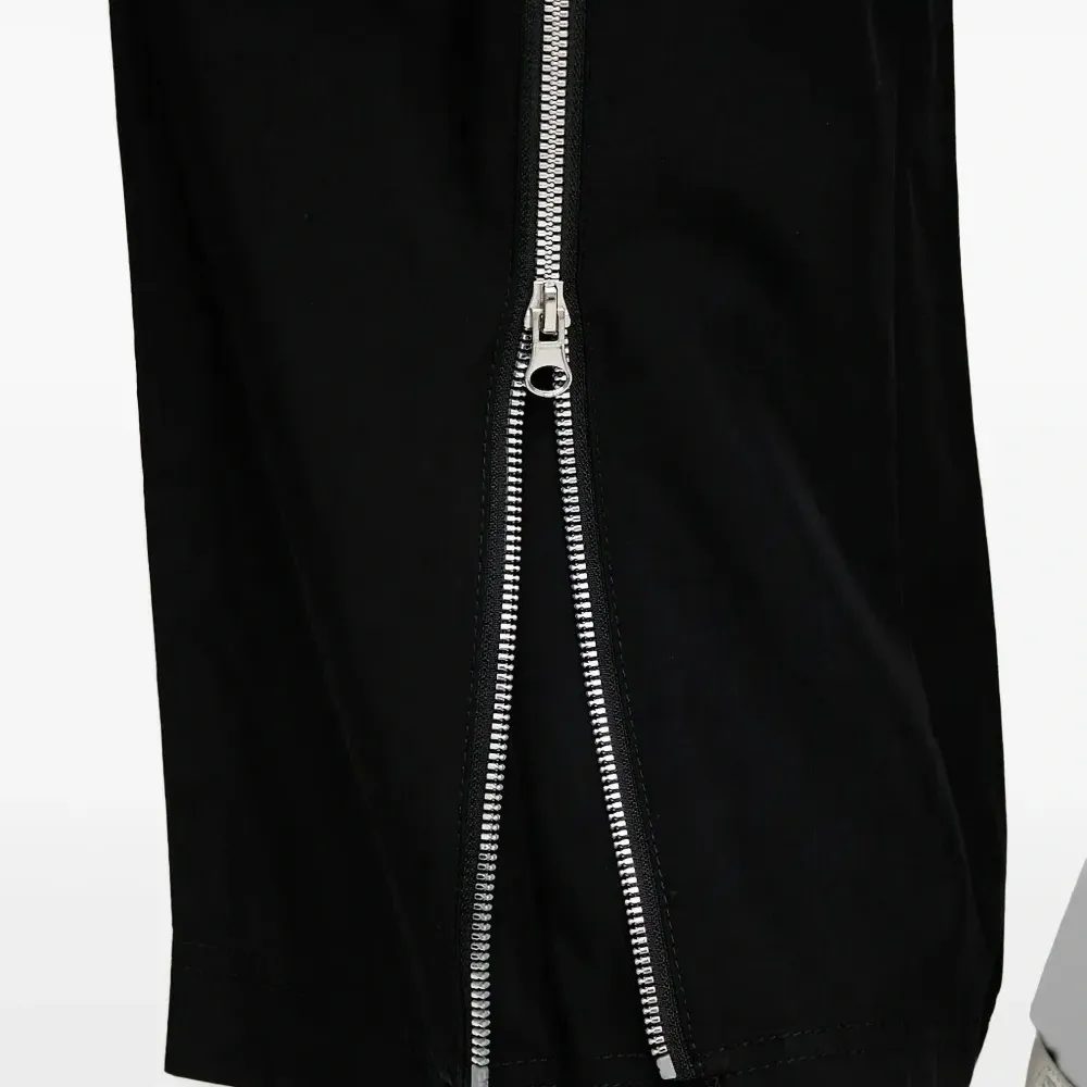 Брюки с молниями