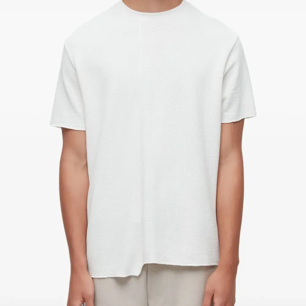 Фактурная рубашка асимметричного кроя