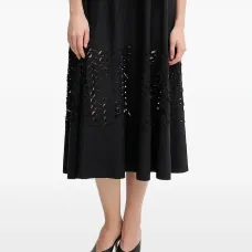 Расклешенная юбка миди с вырезами