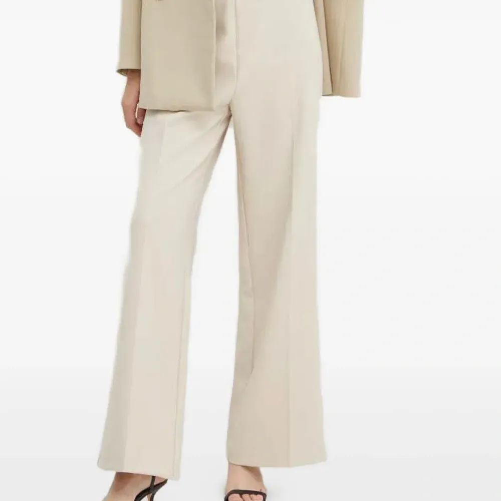 Брюки со складками