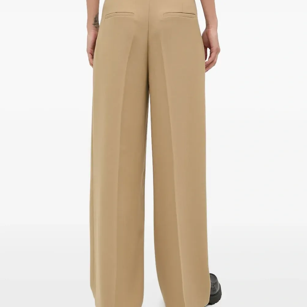 Брюки с карманами