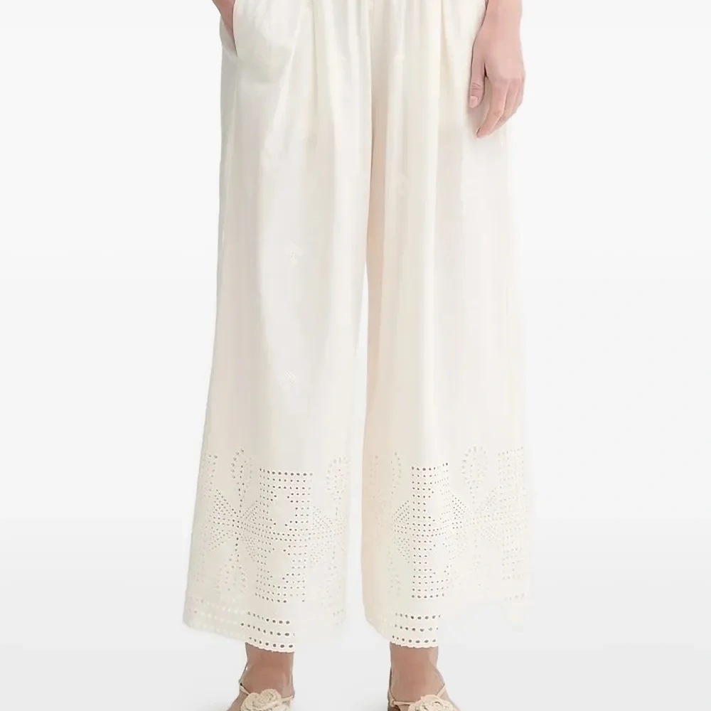 Брюки с люверсами и вышивкой Брюки с люверсами и вышивкой