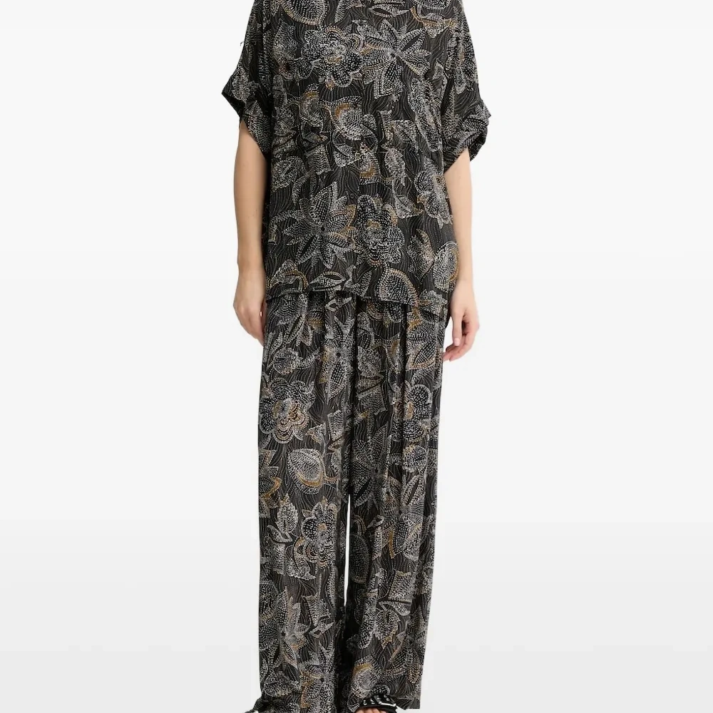 Брюки с цветочным принтом Брюки с цветочным принтом