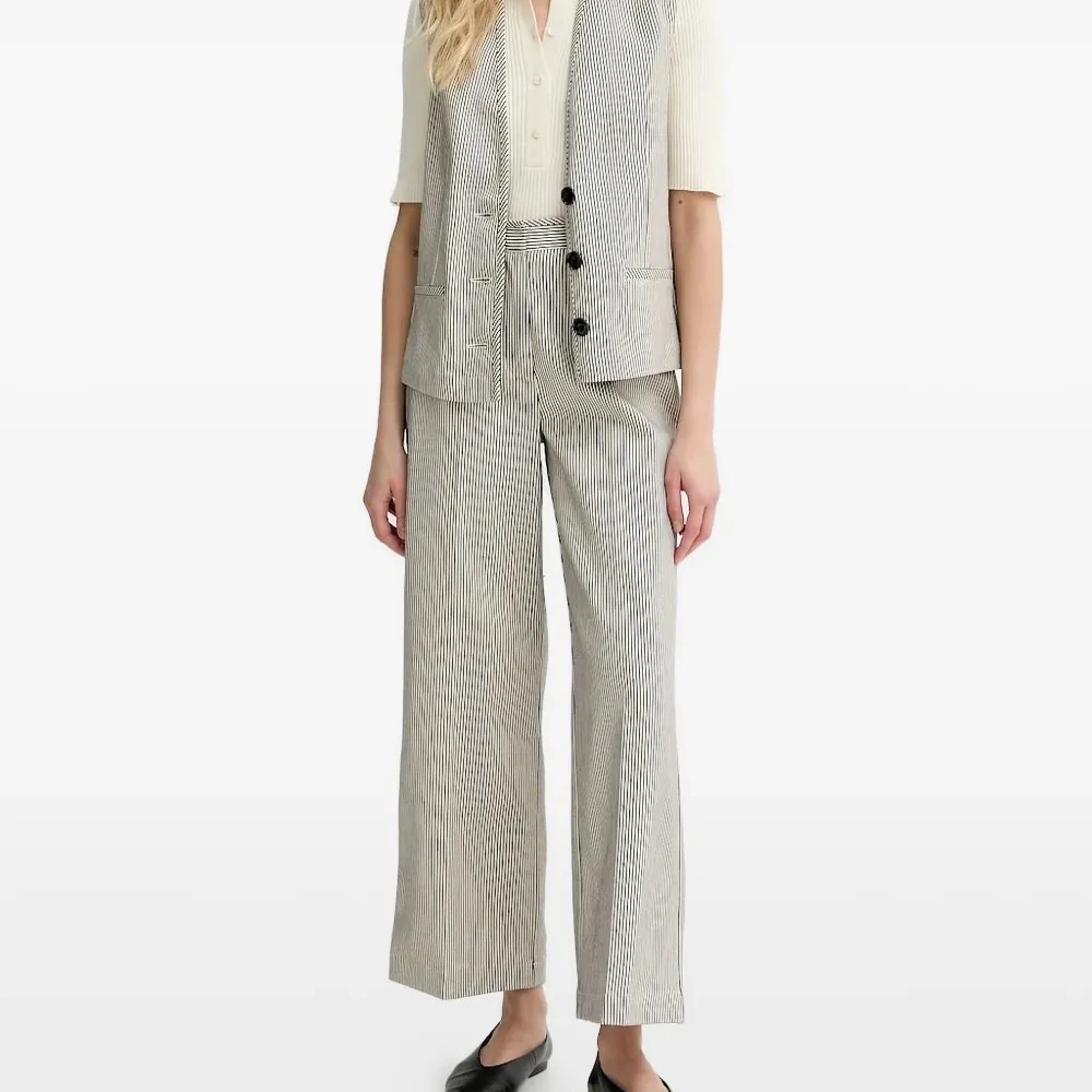 Брюки в полоску Брюки в полоску