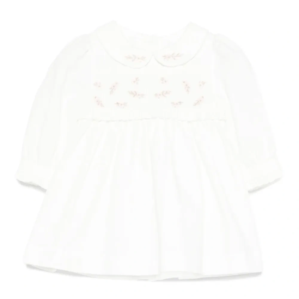 Платье со сборками и вышивкой