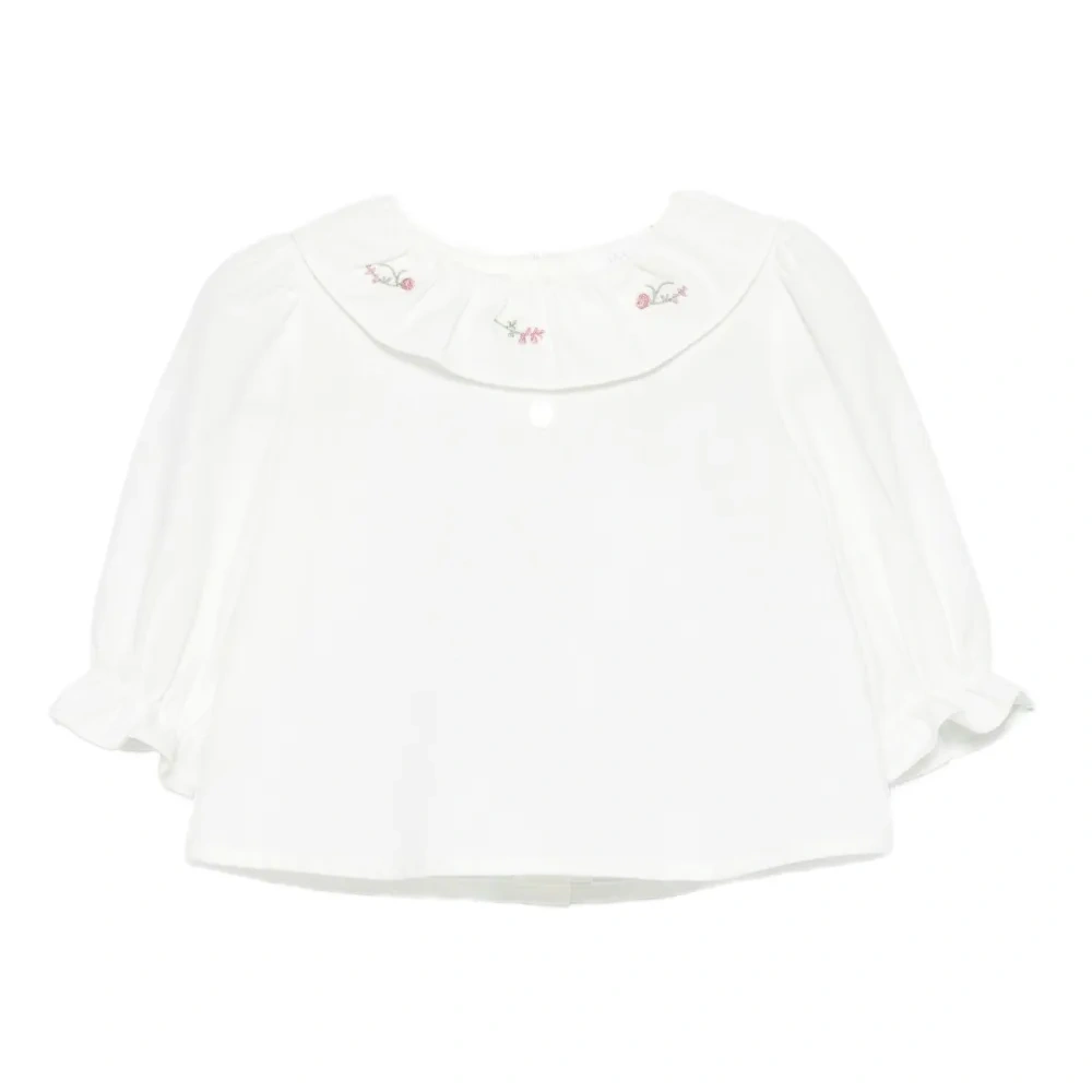 Блузка с оборками и вышивкой