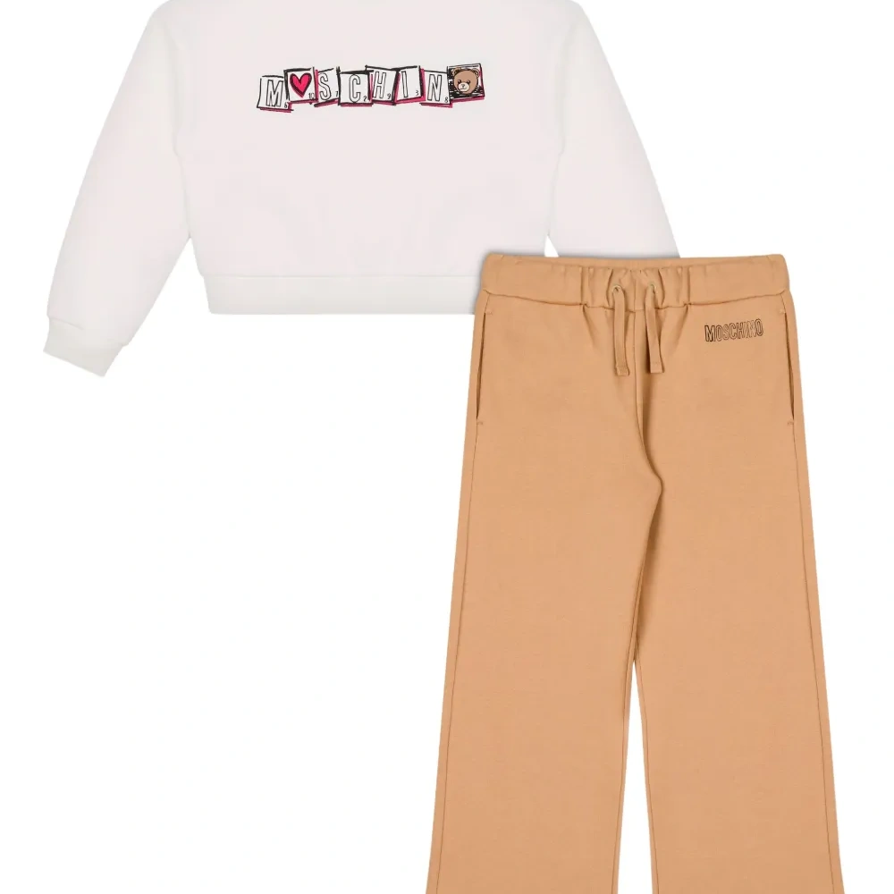 комплект из толстовки и брюк широкого кроя с графичным принтом