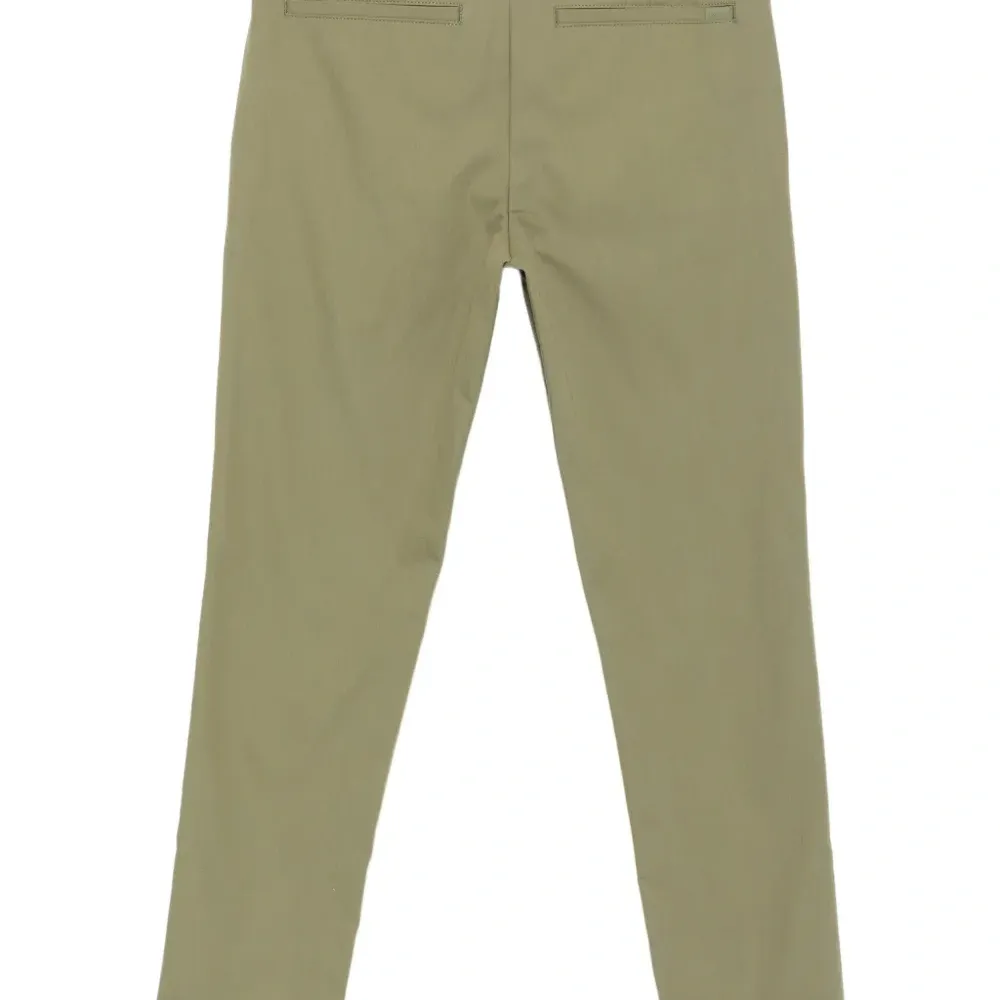 Брюки скинни с карманами на молнии