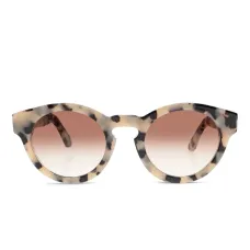Солнцезащитные очки в круглой оправе
