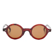 Солнцезащитные очки в круглой оправе