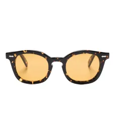 Солнцезащитные очки в круглой оправе