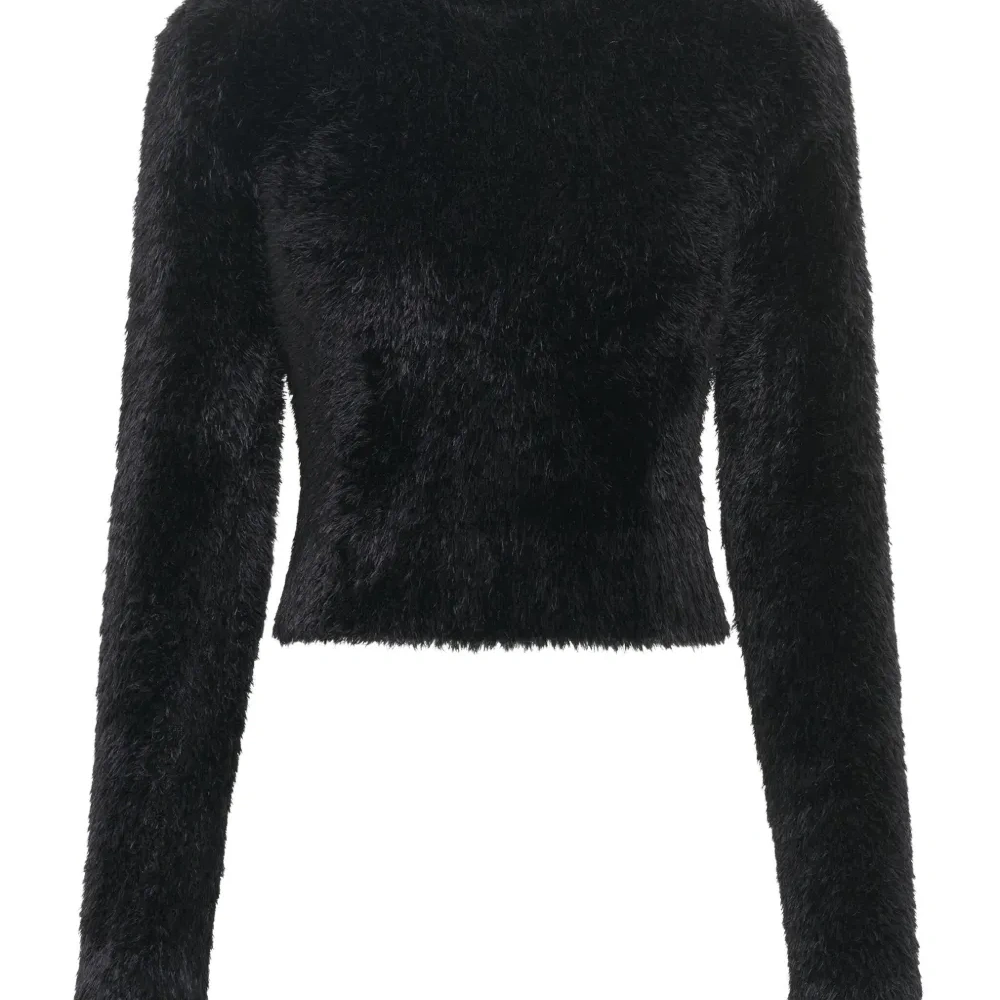 Пушистый свитер с круглым вырезом