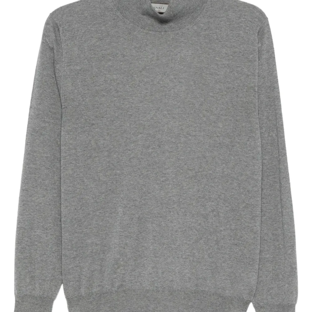 шерстяной свитер с высоким воротником