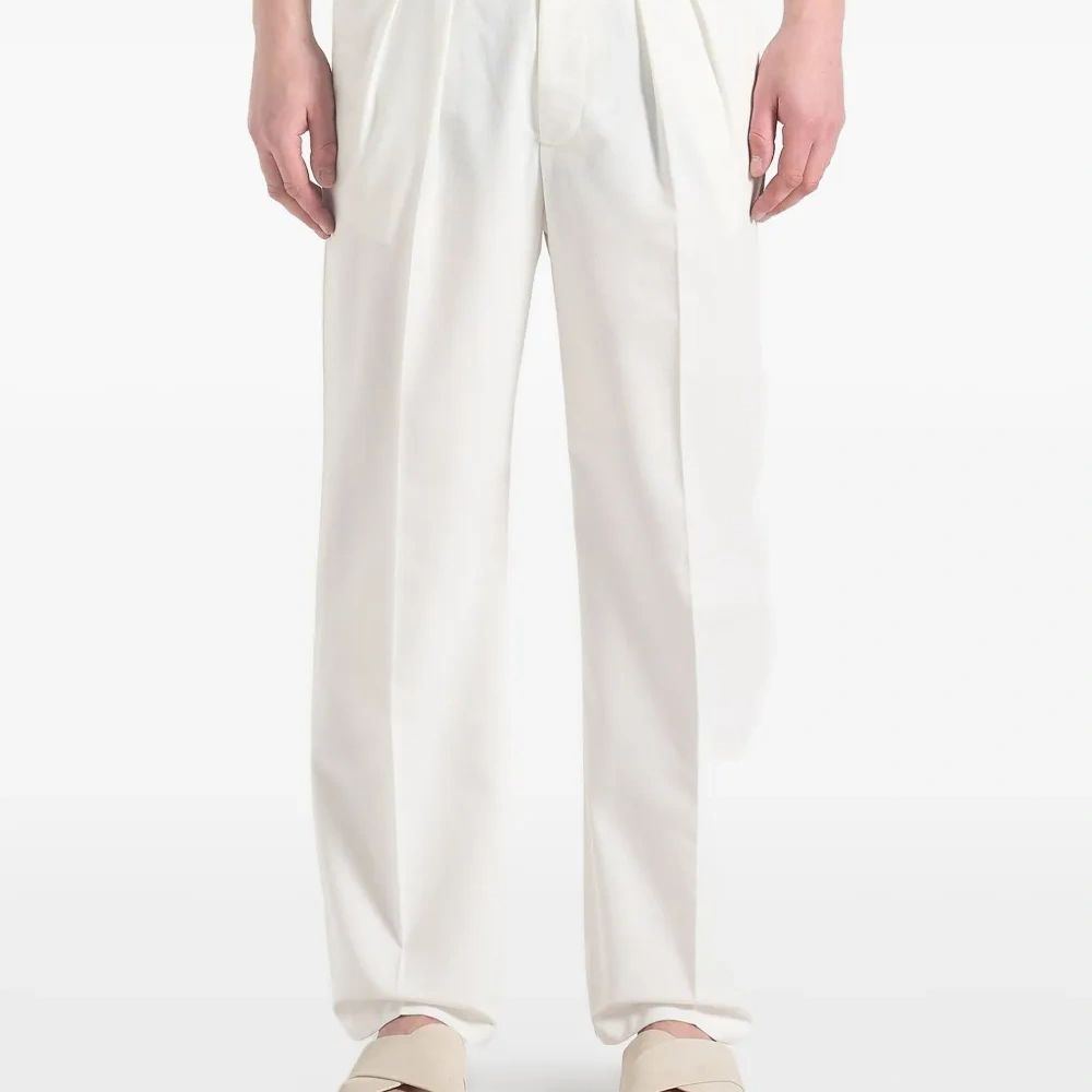 льняные брюки Pierre со складками