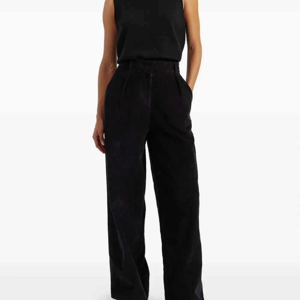 Вельветовые брюки со складками