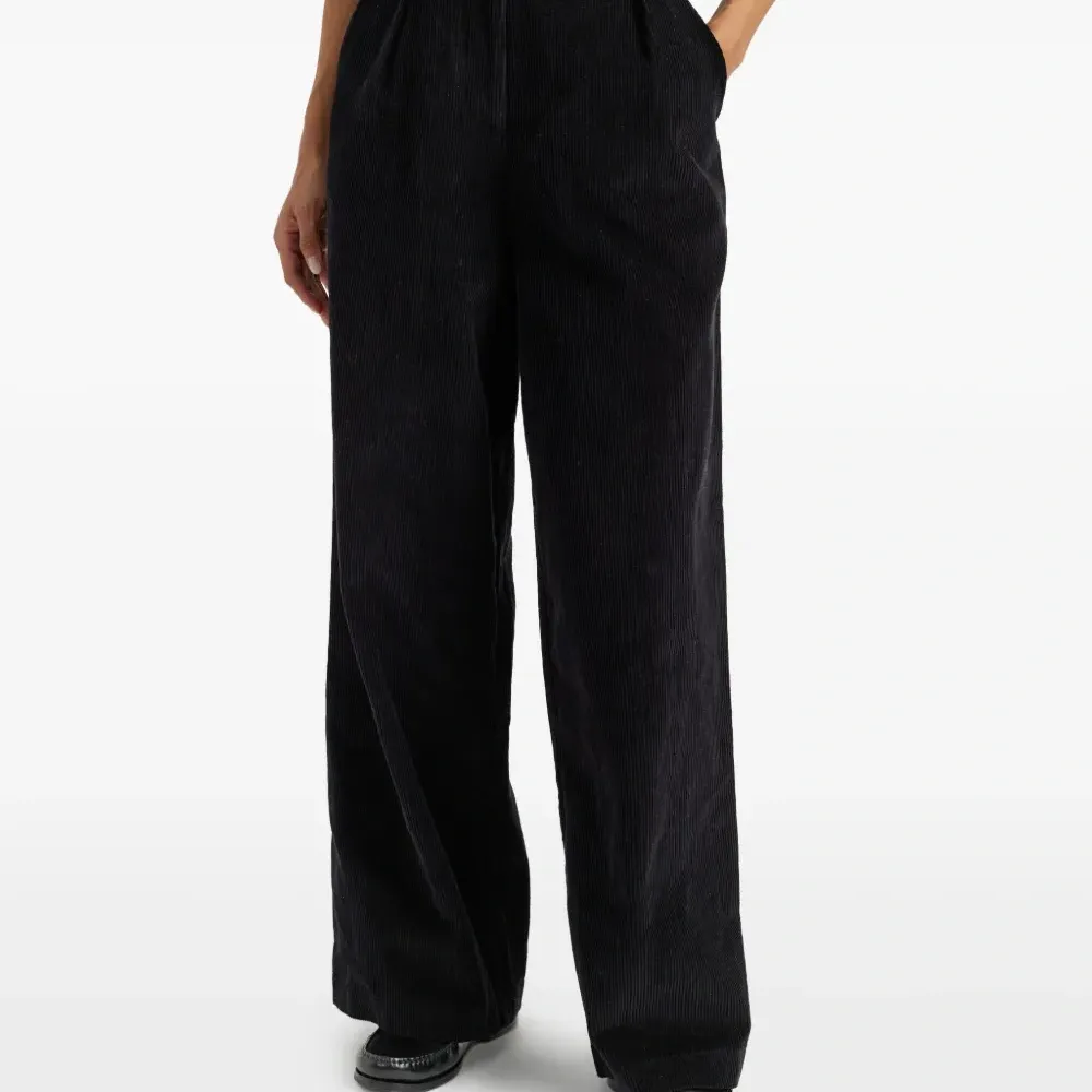 Вельветовые брюки со складками