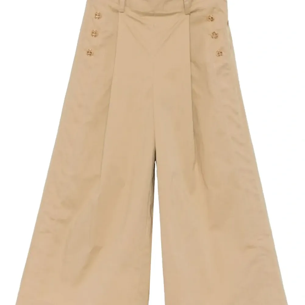 Брюки с оборками Брюки с оборками