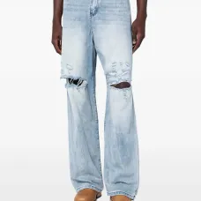 Джинсы с эффектом потертости