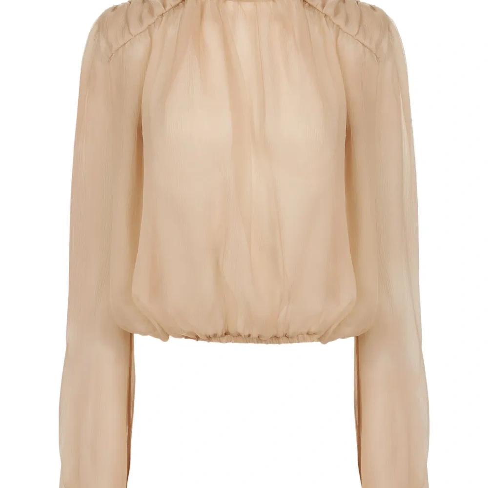 Топ с высоким воротником и объемными рукавами