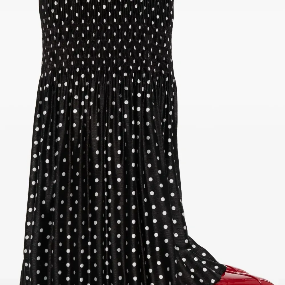 Брюки в горох со складками