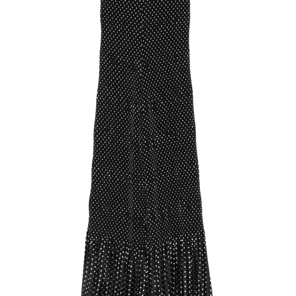 Брюки в горох со складками