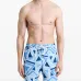Плавки-шорты с геометрическим принтом