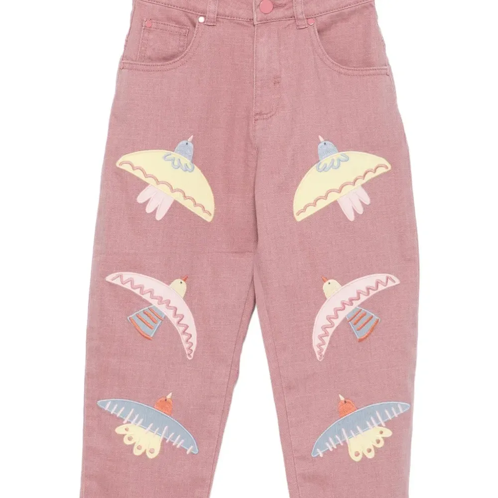 джинсы с вышивкой