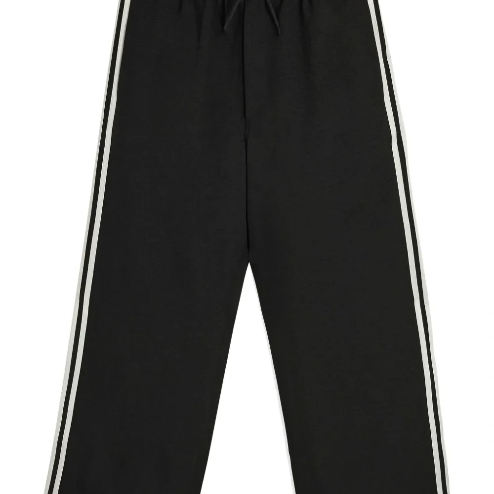 Спортивные брюки широкого кроя