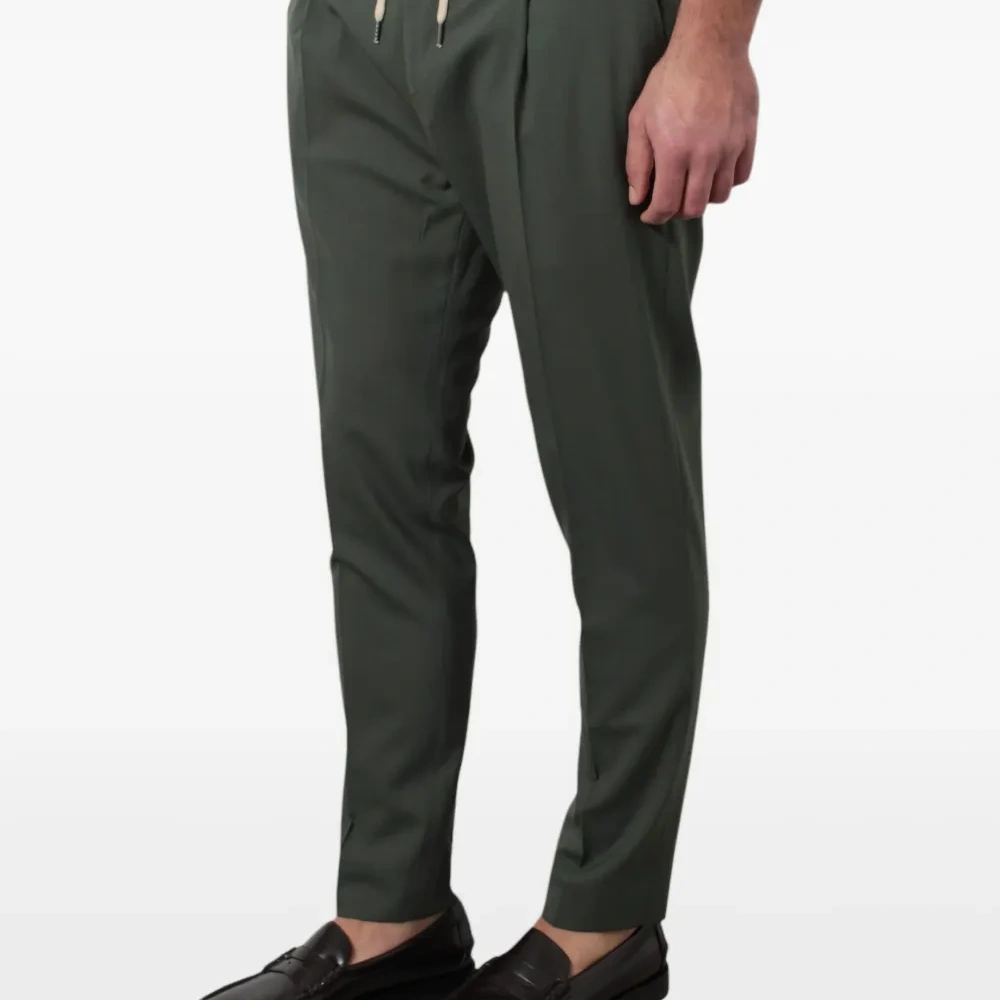 Плиссированные брюки