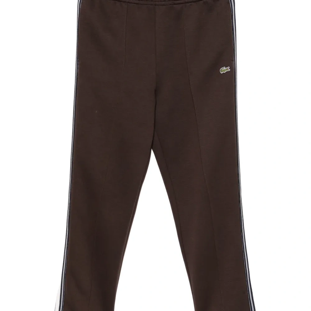 Брюки с вышитым логотипом