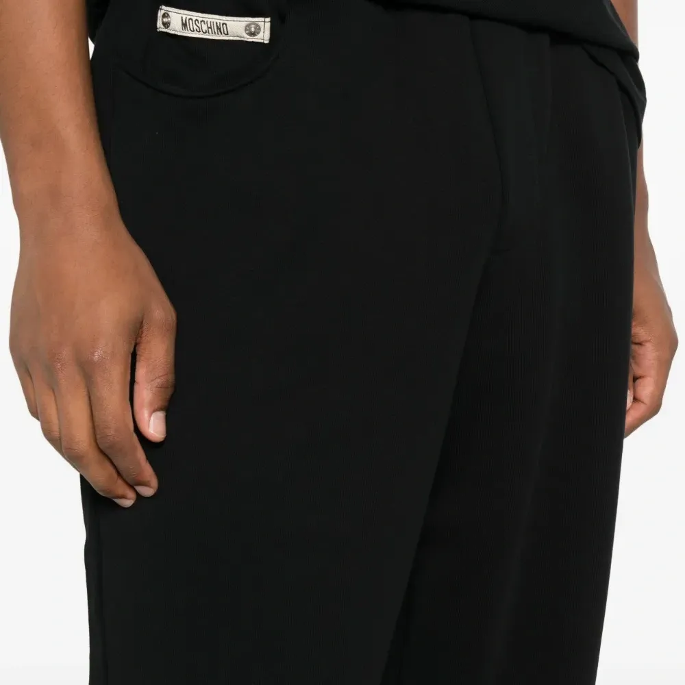 брюки с карманами на молнии