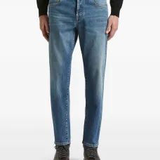 Джинсы с эффектом потертости