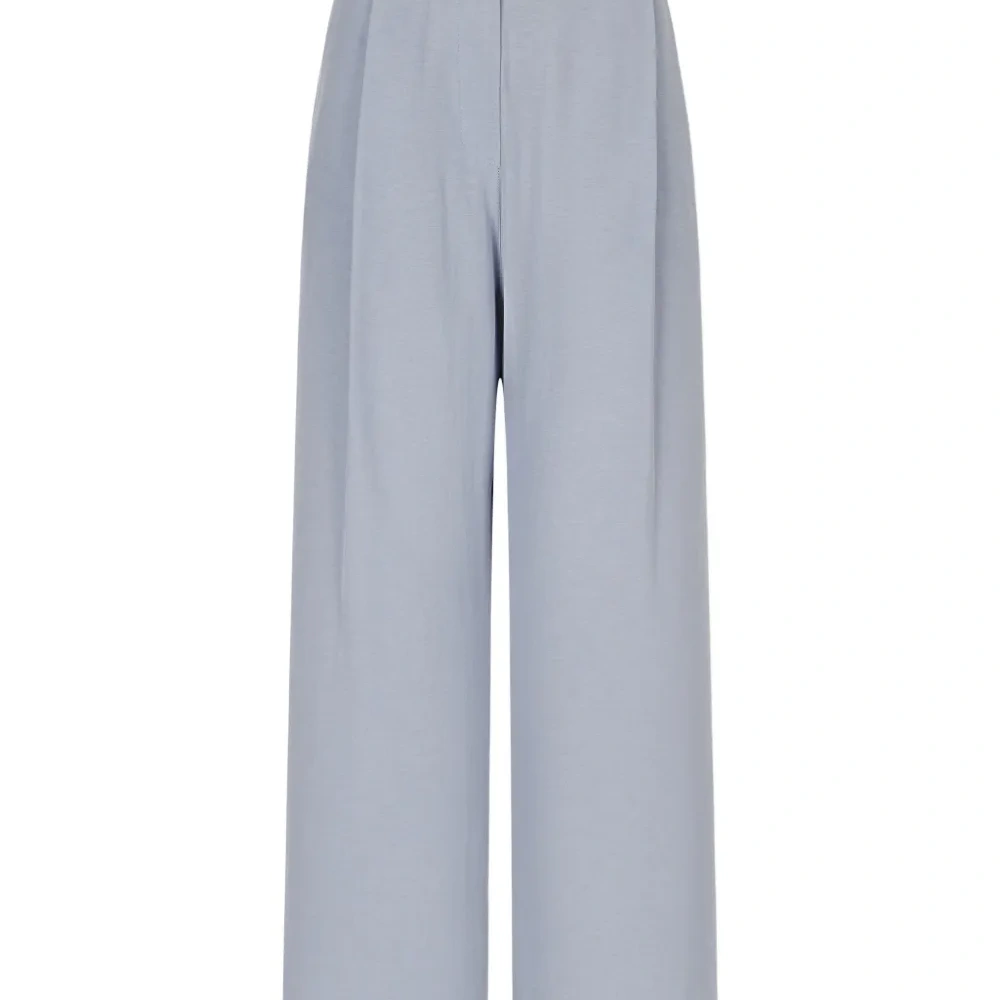 Брюки с люверсами