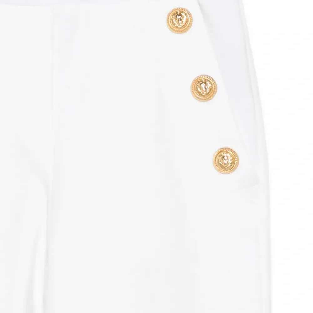 брюки с декоративными пуговицами брюки с декоративными пуговицами