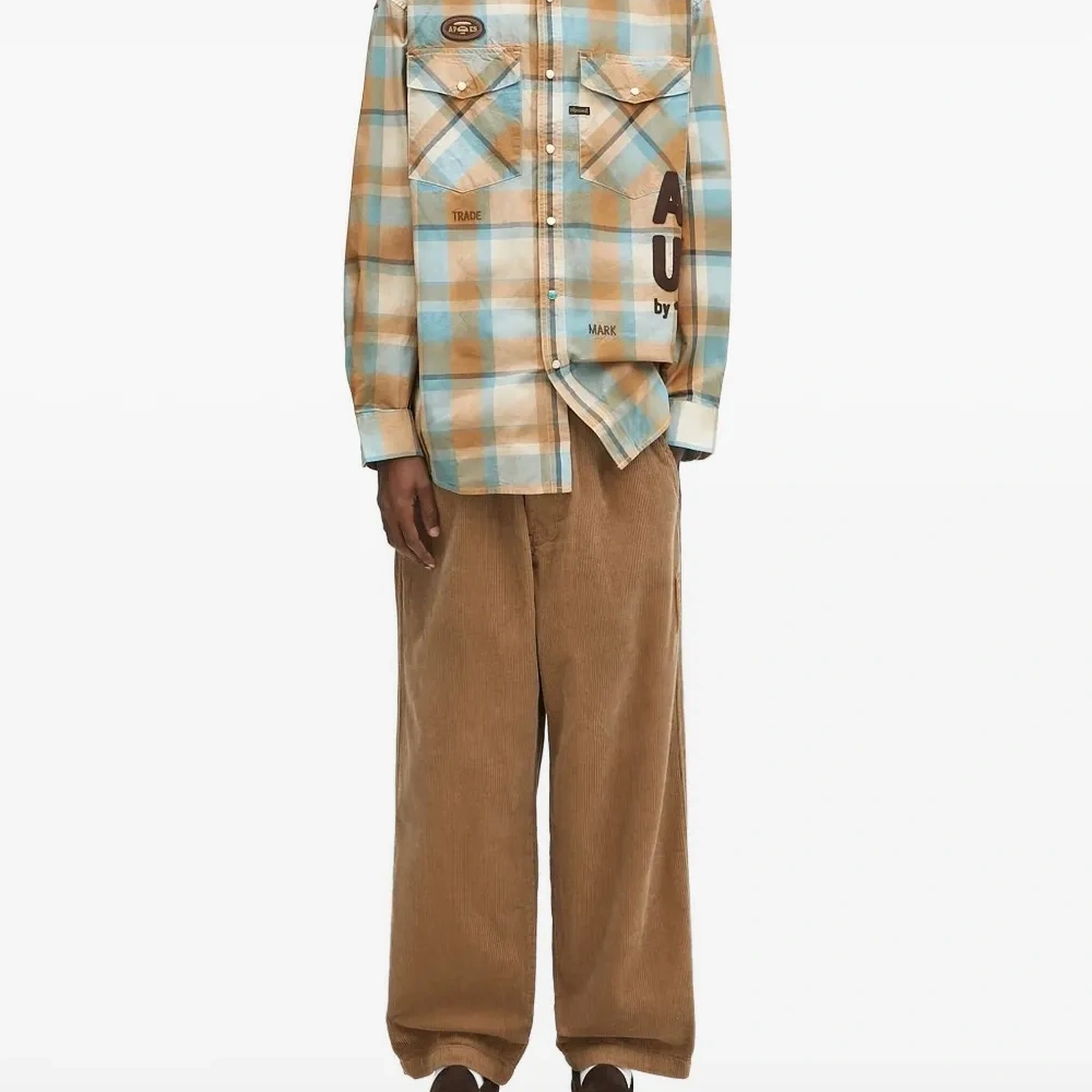 Клетчатая рубашка с логотипом