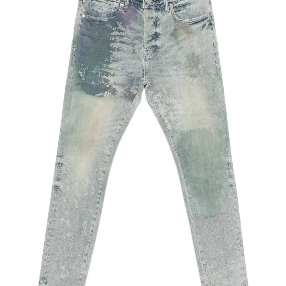 Джинсы с эффектом потертости