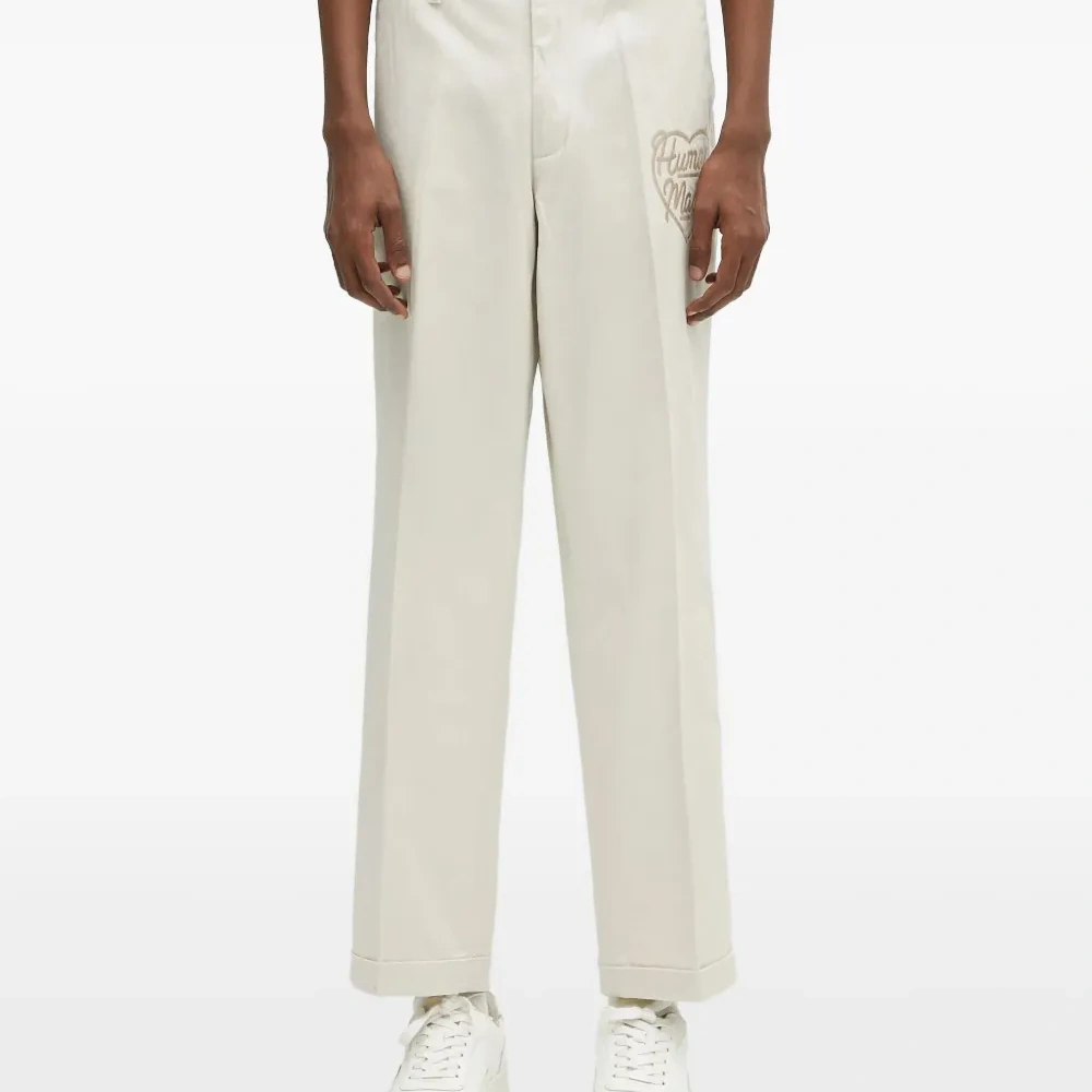 брюки с вышивкой и складками