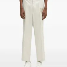 брюки с вышивкой и складками брюки с вышивкой и складками