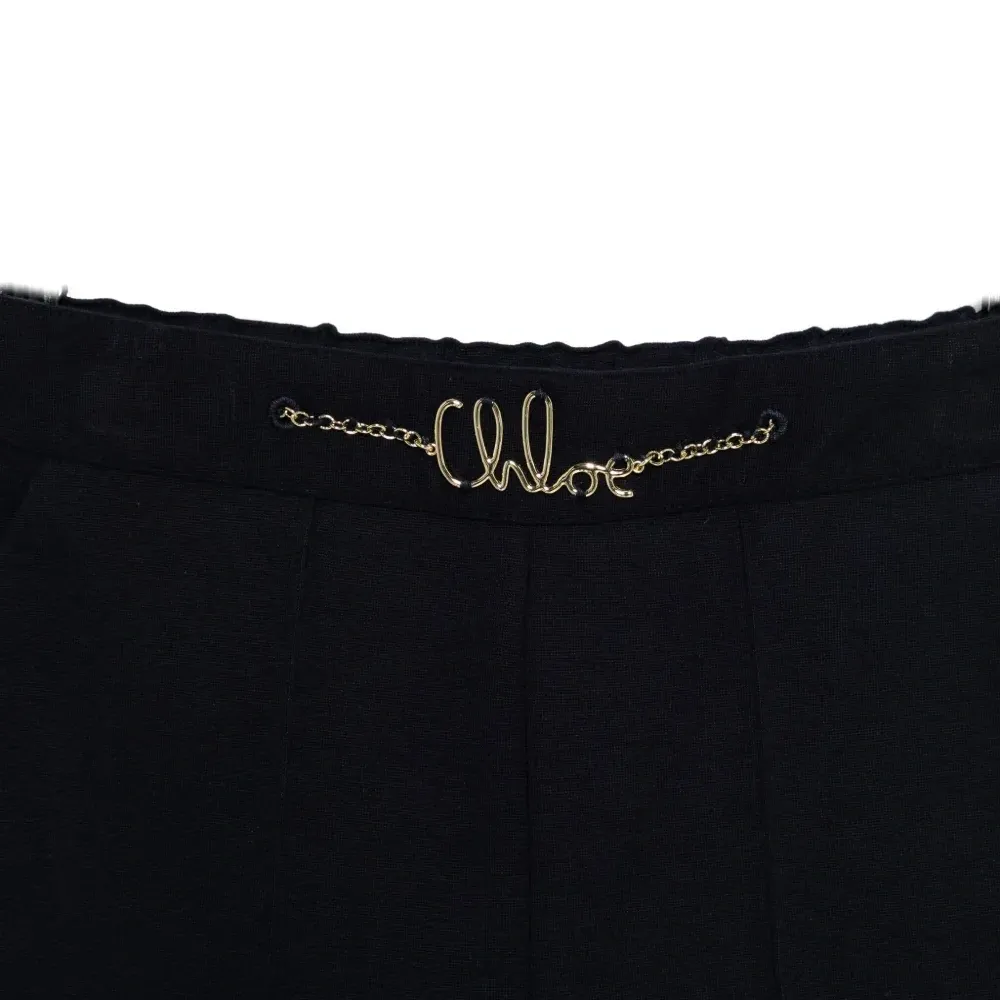 брюки с цепочкой