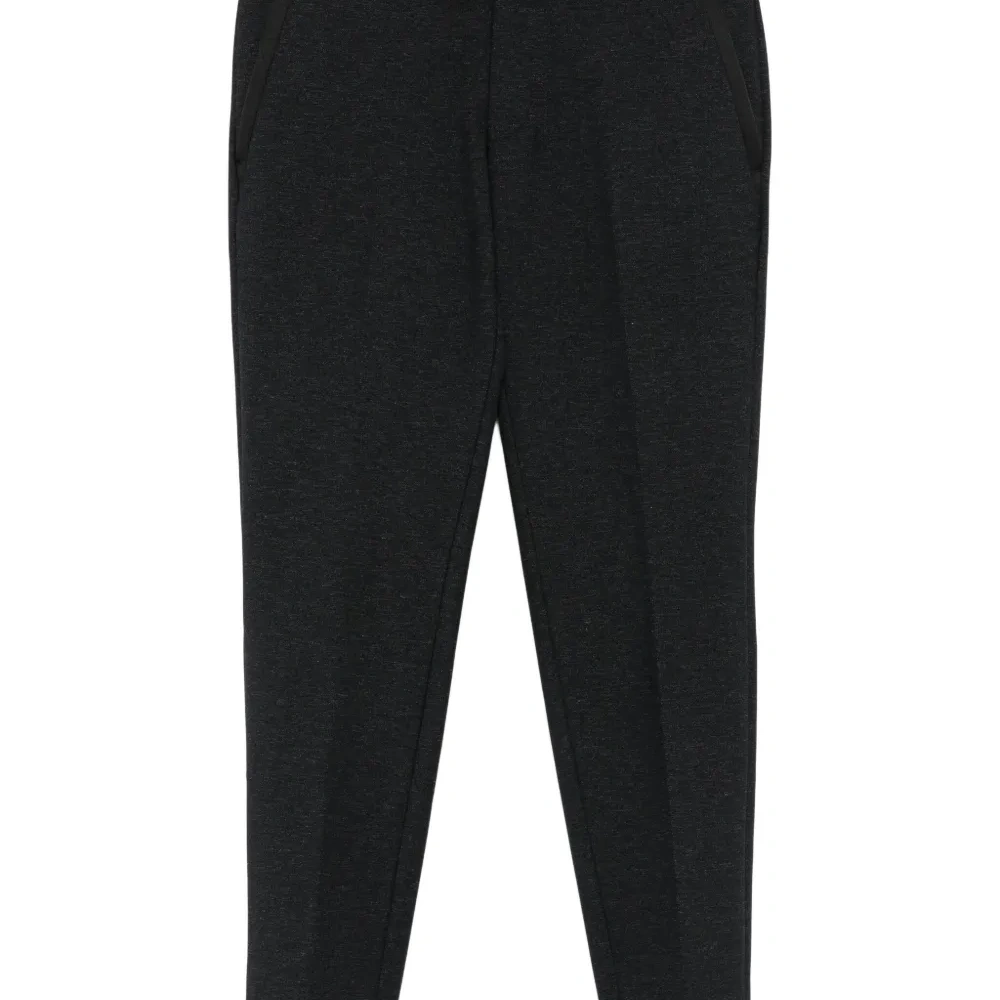 Фактурные брюки с карманами