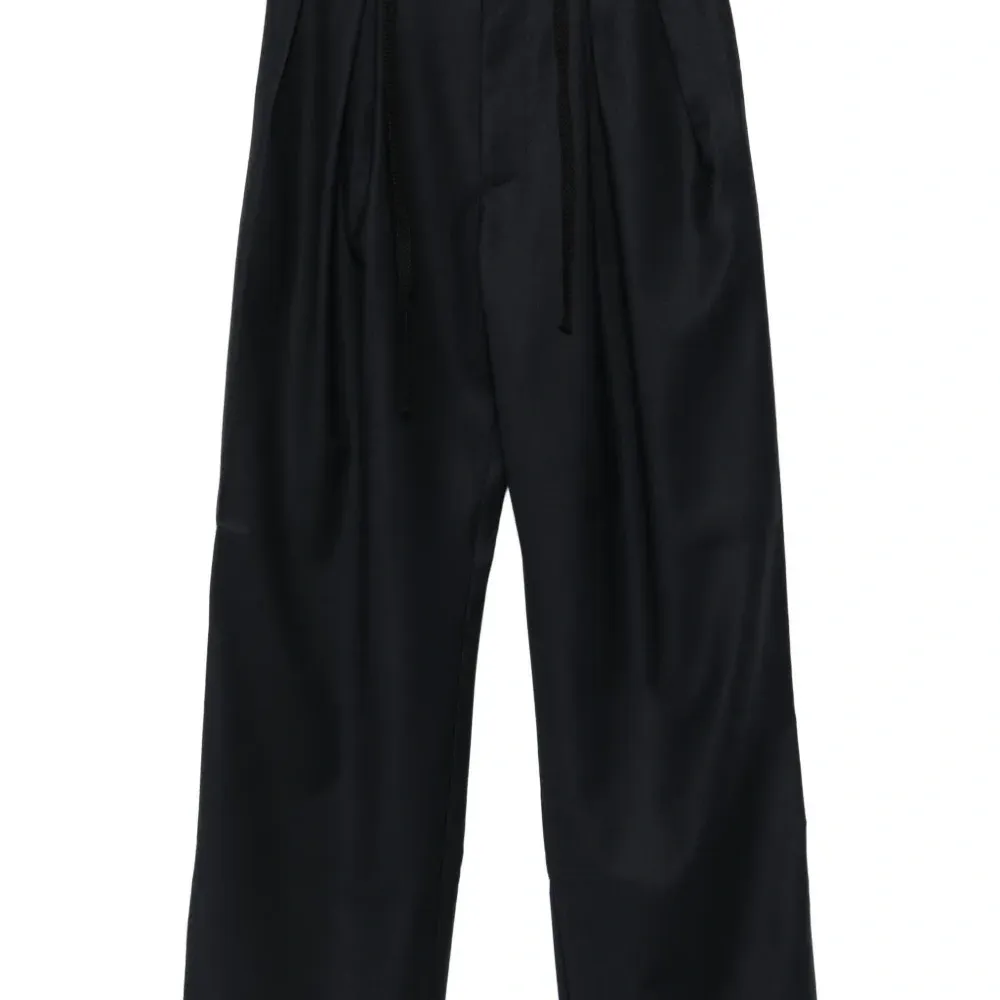 Плиссированные брюки