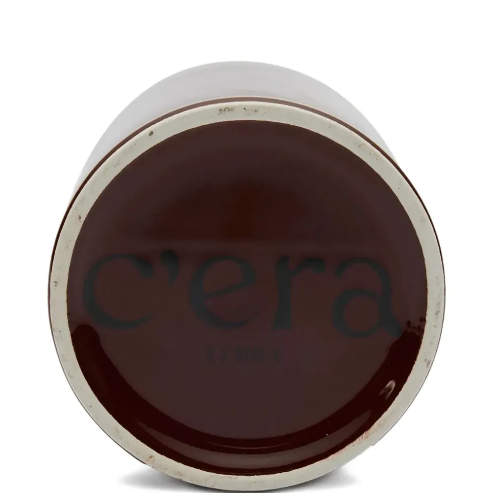 Свеча в керамическом подсвечнике