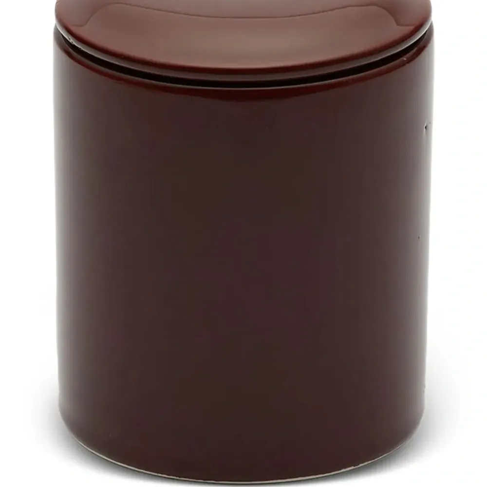 Свеча в керамическом подсвечнике