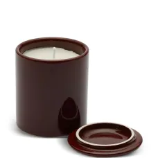 Свеча в керамическом подсвечнике